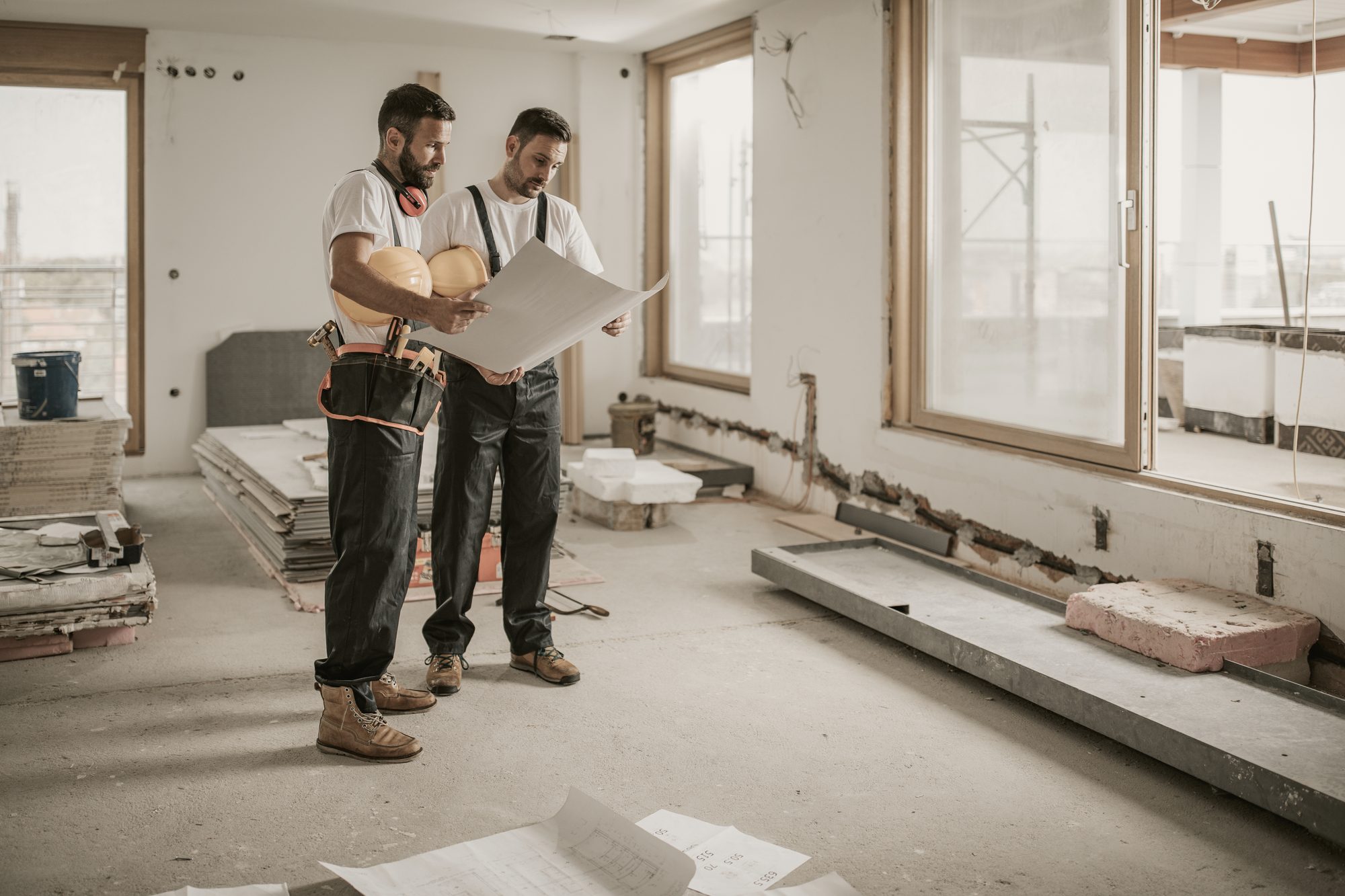 Builders looking over plans.