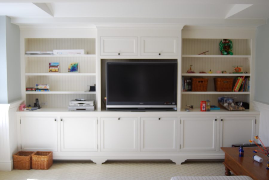 Wall of custom cabinetry and open shelving