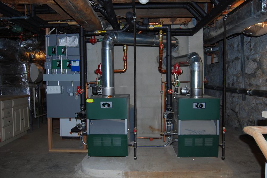 The new basement beneath, with the heating plant that came with it